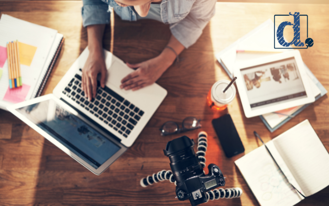 person at desk creating video